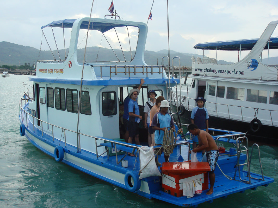 Guests returning to Chalong Pier Phuket,Prasert Seri Fishing boat Charter in Phuket Thailand Picture